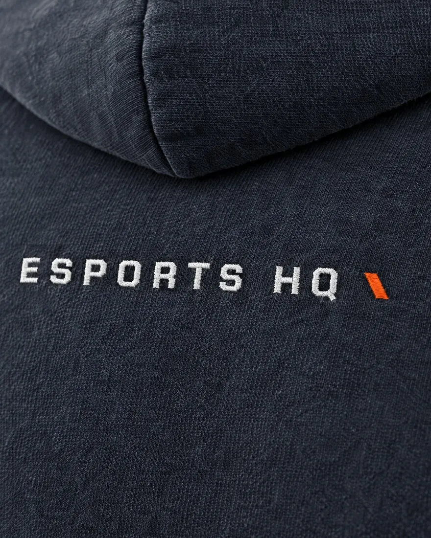 Close-up of the embroidered wordmark below the hood